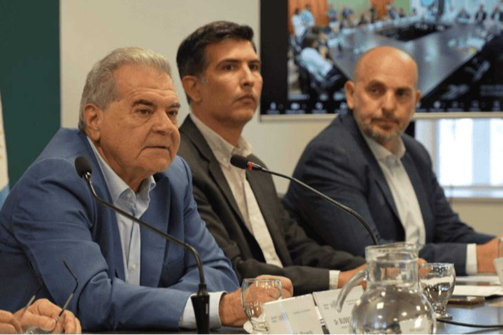 El ministro de Bioagroindustria de Córdoba, Sergio Busso, y dos de sus colaboradores.