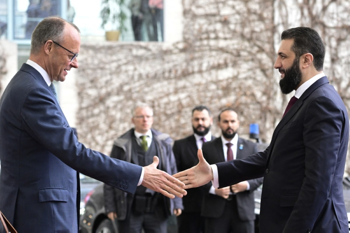 Ahmed al Sharaa y Friedrich Merz.