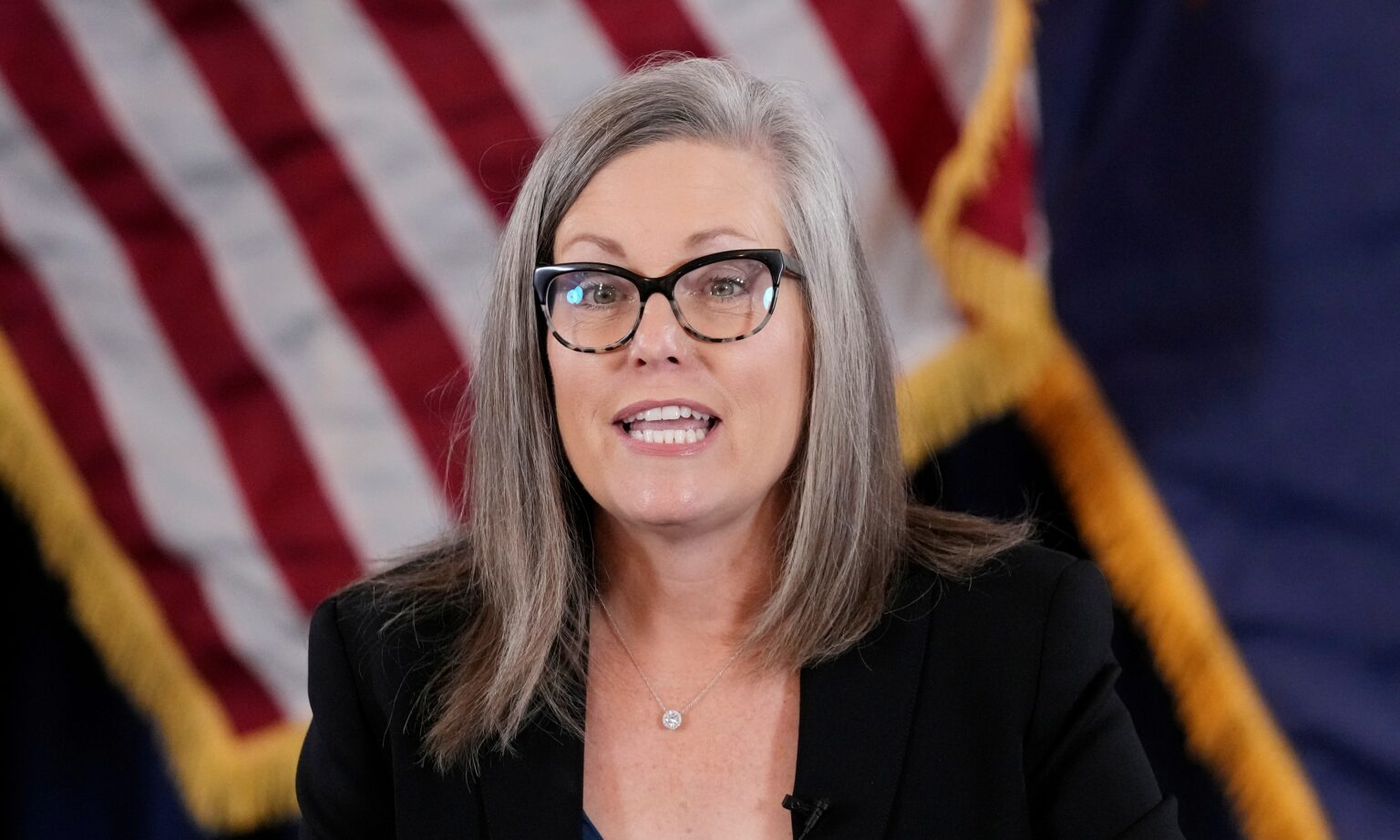 The Democratic Socialist governor of Arizona mentioned that the Charlie Kirk commemorative plaque introduced partisan politics into government functions