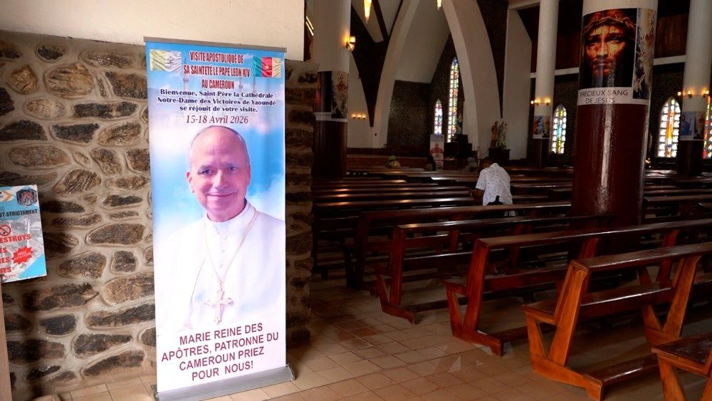 Cameroonian church with an announcement about the trip of Pope Leo XIV