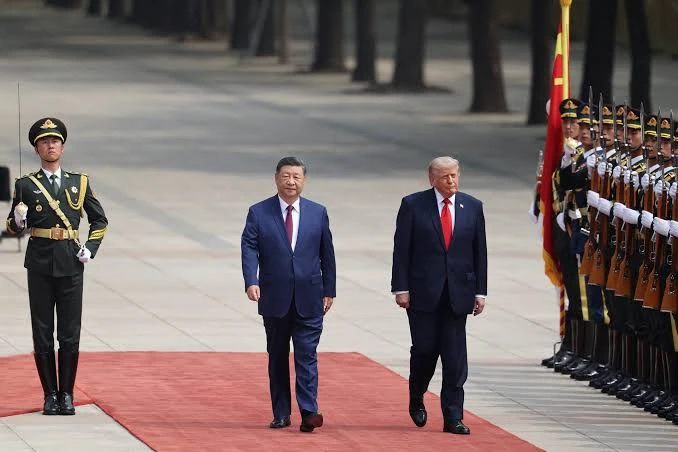Donald Trump junto al dictador Xi Jinping