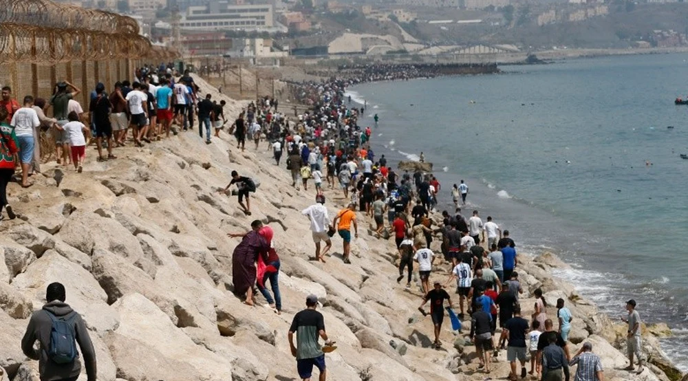 Illegal Moroccan immigrants entering Ceuta