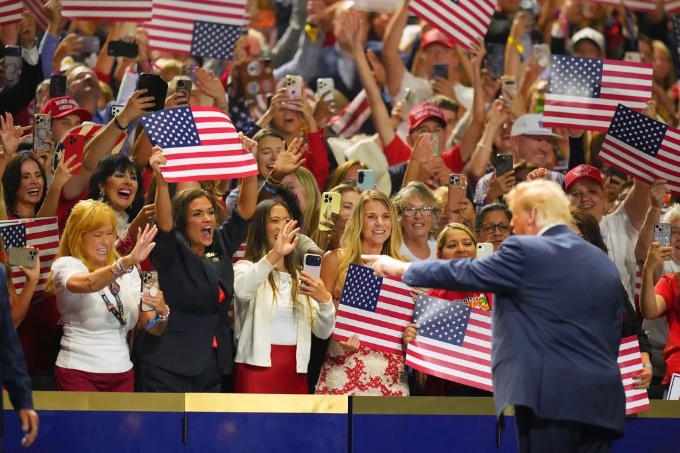 People greet the president
