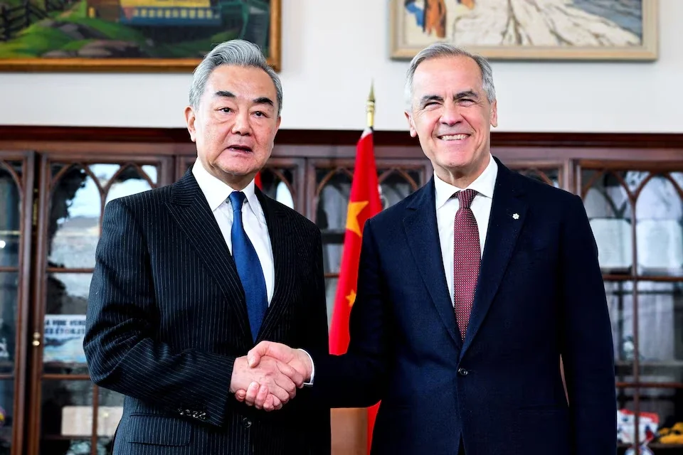 The leftist Prime Minister of Canada held a meeting with the Chinese Foreign Minister.