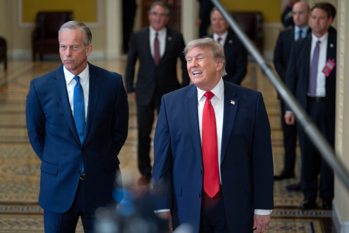 Trump in the Senate alongside the Republican leader, John Thune