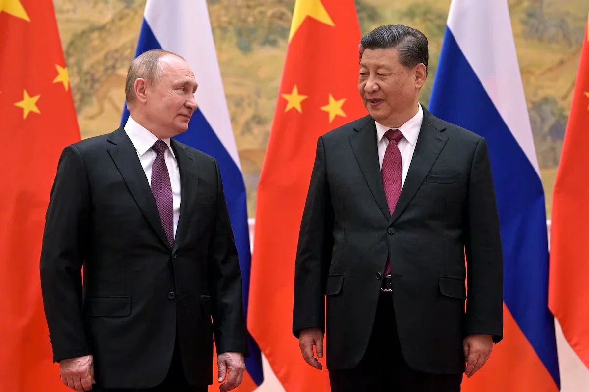 Vladimir Putin junto a Xi Xinping.