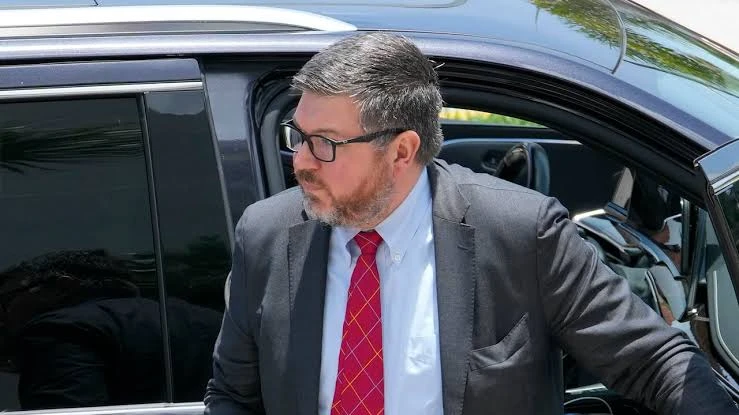 Stanley Woodward, deputy attorney general, warned that no company can use uncertainty to commit acts of fraud