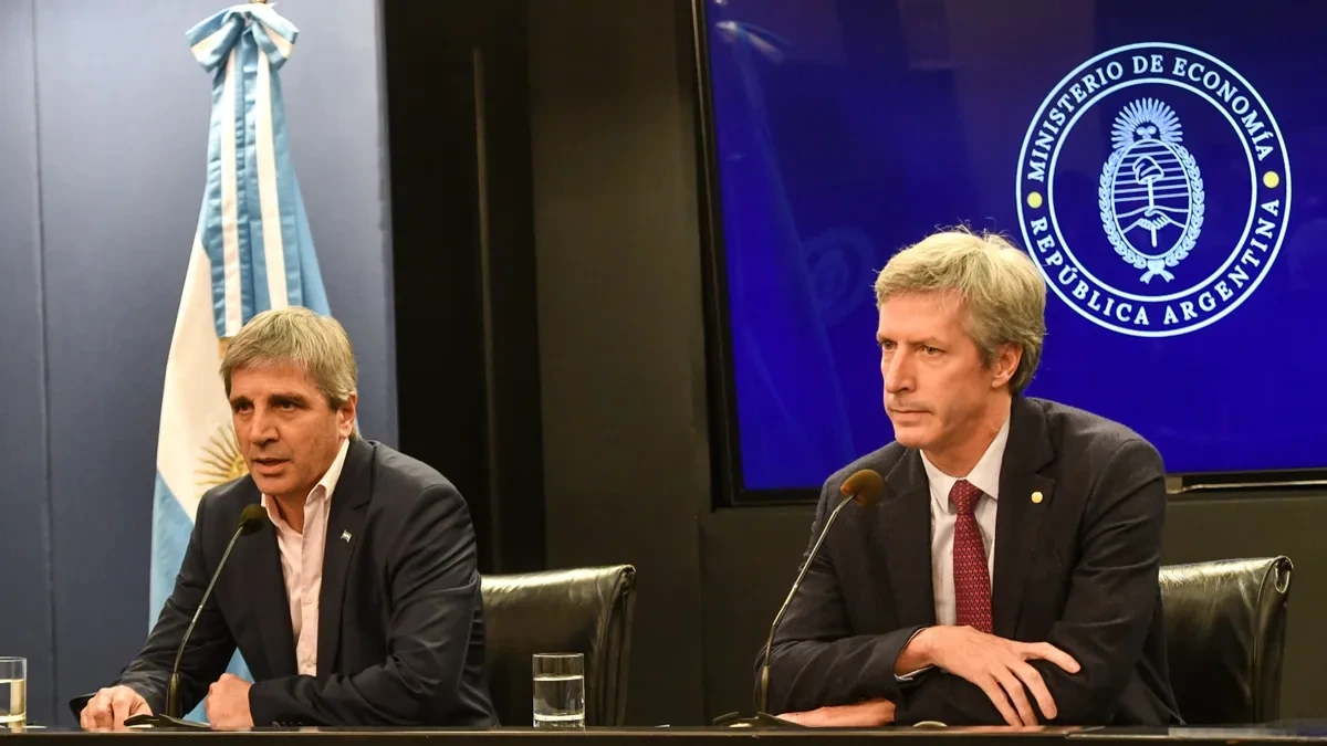 Luis Caputo and Santiago Bausilli