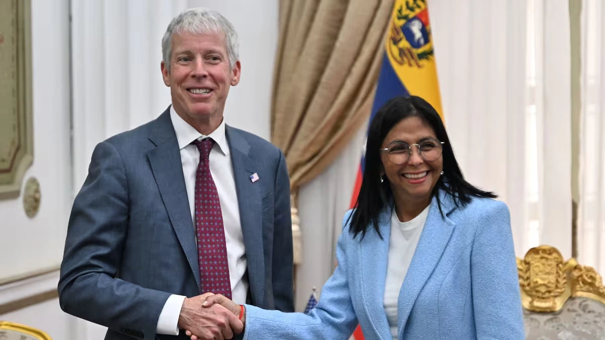 Chris Wright and Delcy Rodríguez