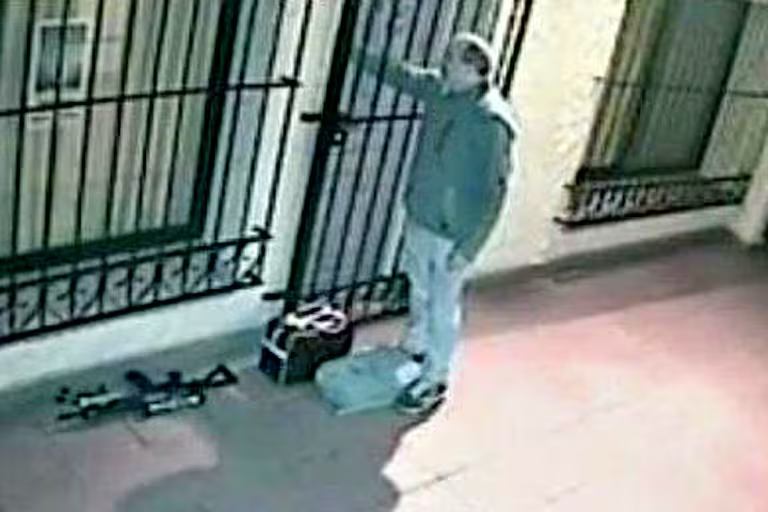 The famous image of López hiding a rifle and bags with millions in a convent.