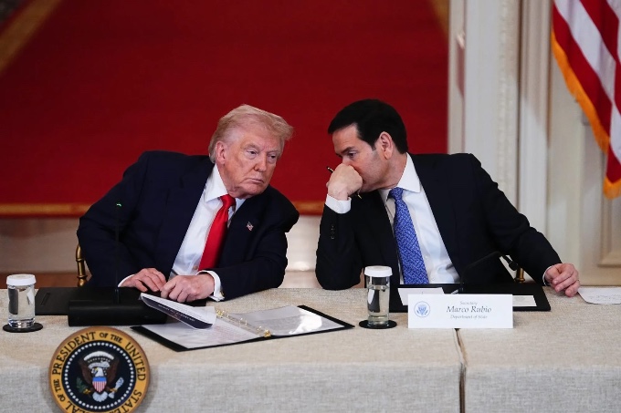 The Secretary of State, Marco Rubio, along with Trump.