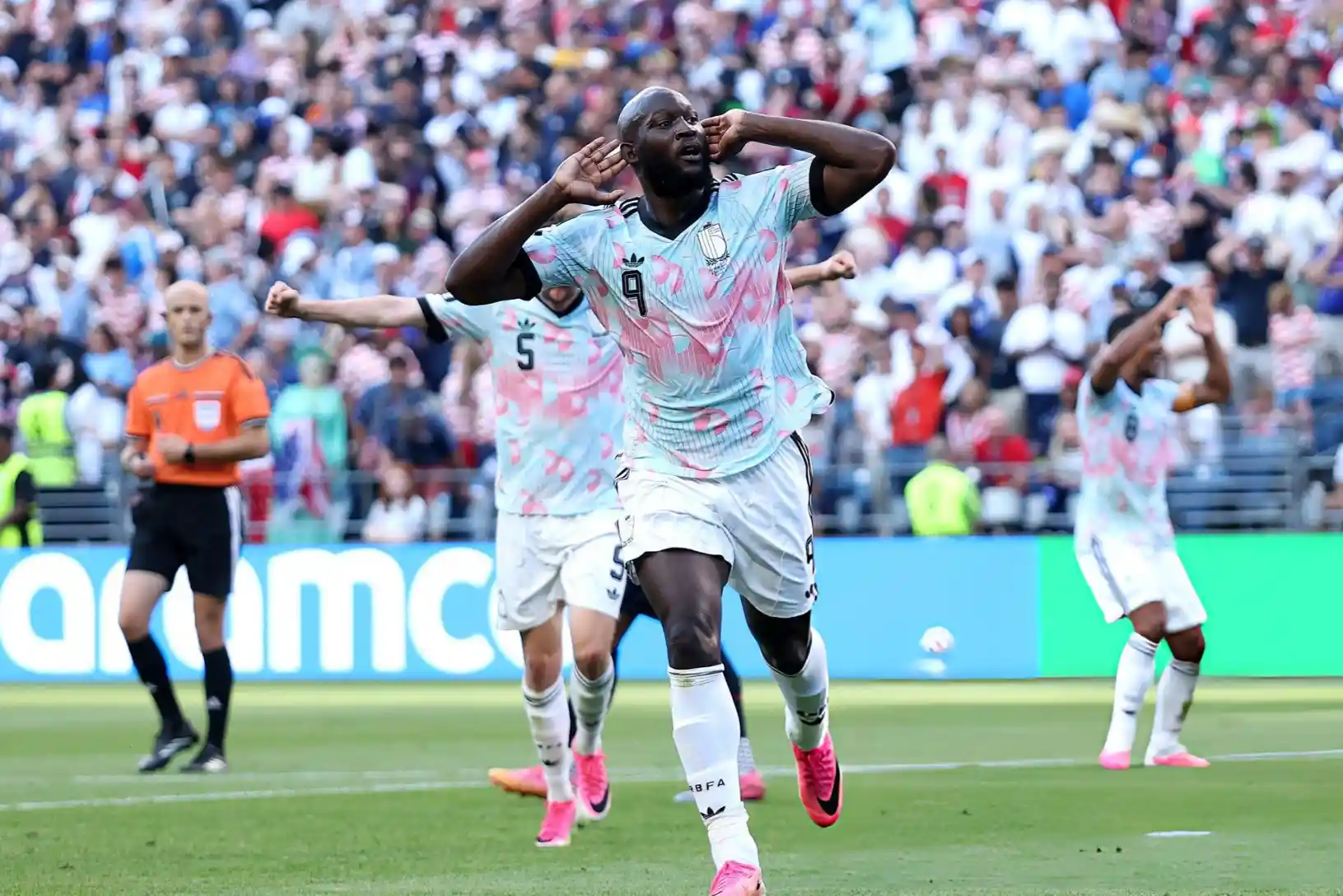 It's called football not soccer: Belgium thrashed the United States 4-1 and advanced to the quarter-finals